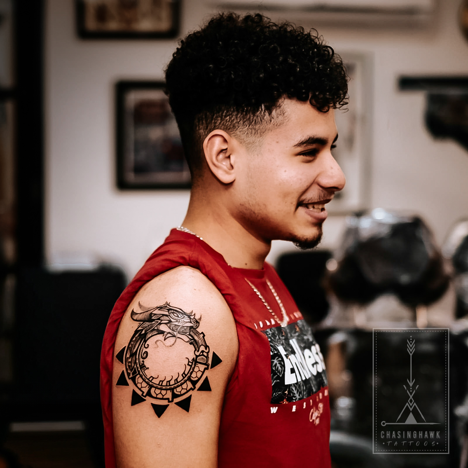 Dragon Ouroboros — Neo-Indigenous tattoo by Chasinghawk Tattoos